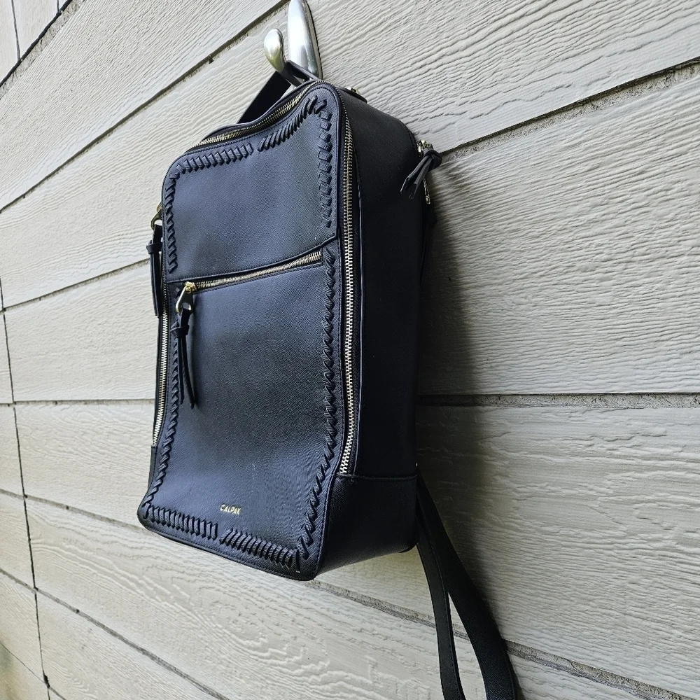 Calpak Kaya black faux leather laptop travel backpack